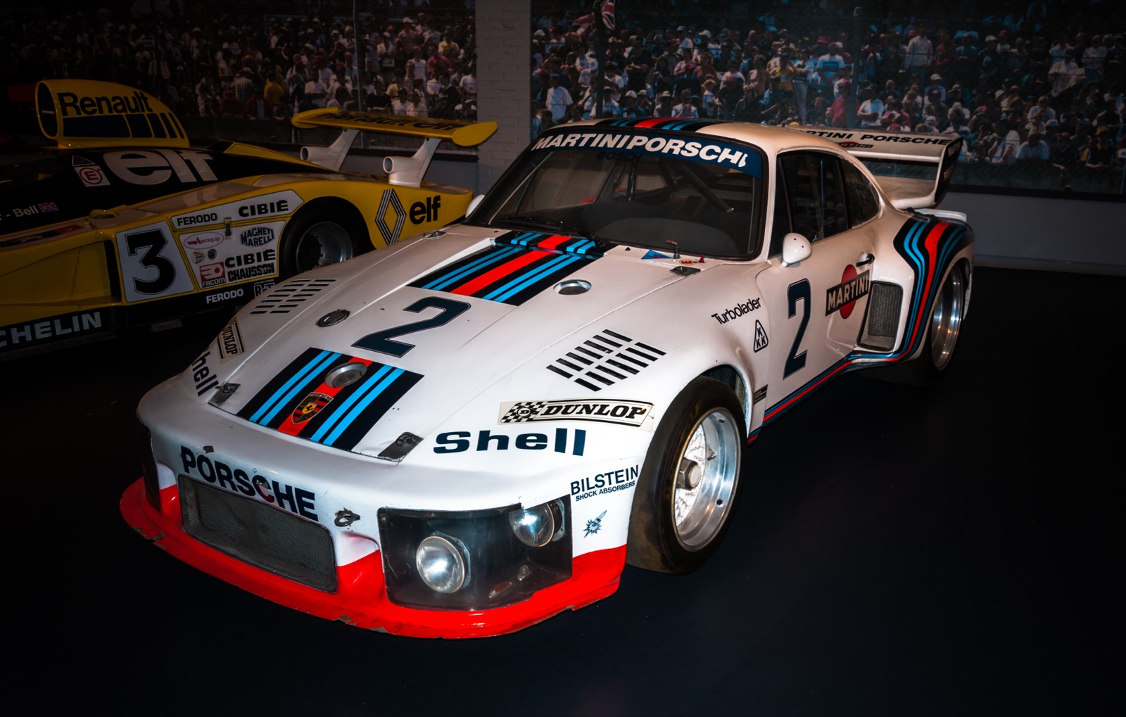 Porsche 935 in Martini Racing livery — white with red and blue stripes